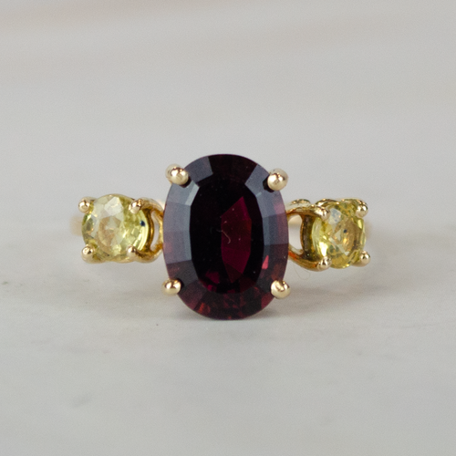 Burgundy Passion Gold Rhodolite and Sapphires Ring