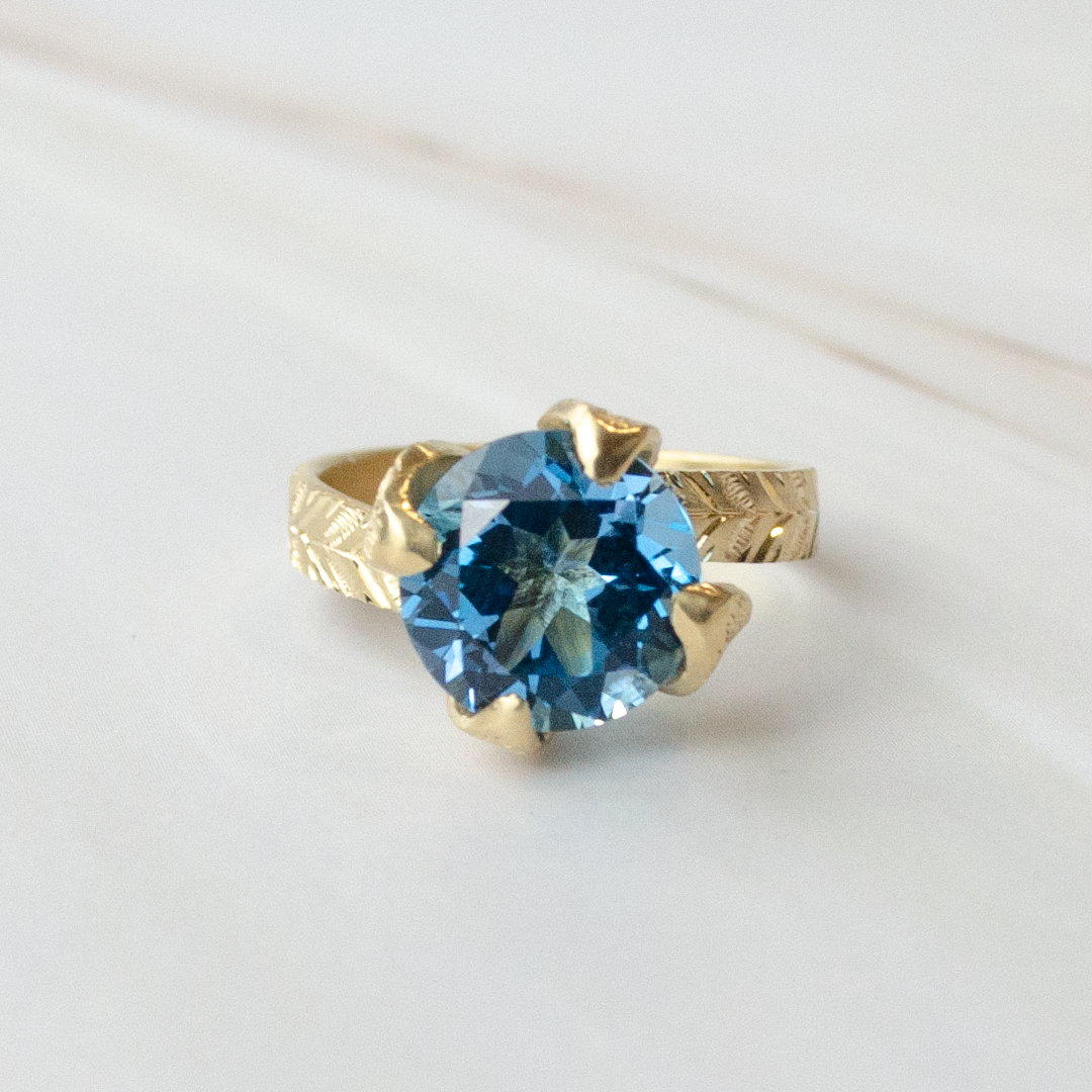 Anillo de Oro Amarillo con Topacio Azul Princess Nature 