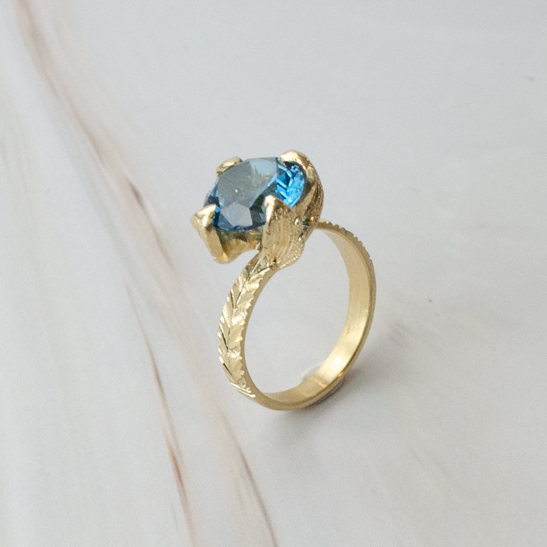 Anillo de Oro Amarillo con Topacio Azul Princess Nature 